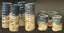 Mugs with Finger Grooves and pressed lizards